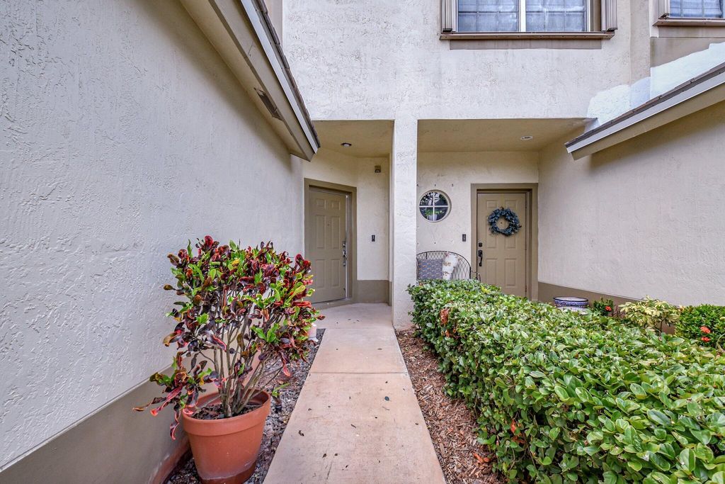 Photo of 6306 Crescent Lake Way, Greenacres, FL 33463 (MLS # B26026536)