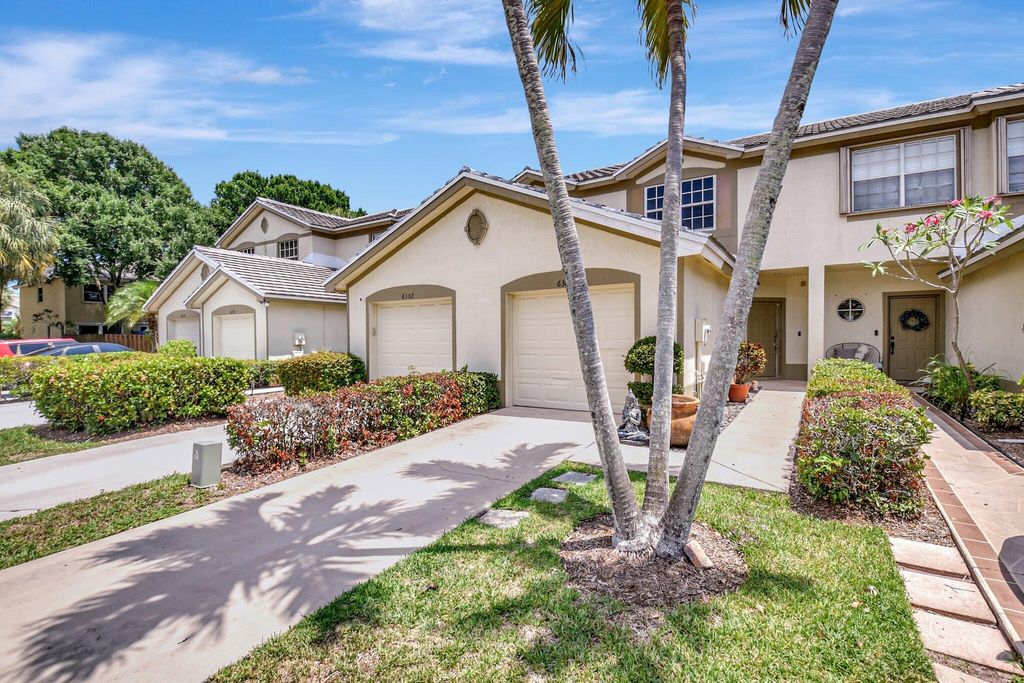 Photo of 6306 Crescent Lake Way, Greenacres, FL 33463 (MLS # B26026536)