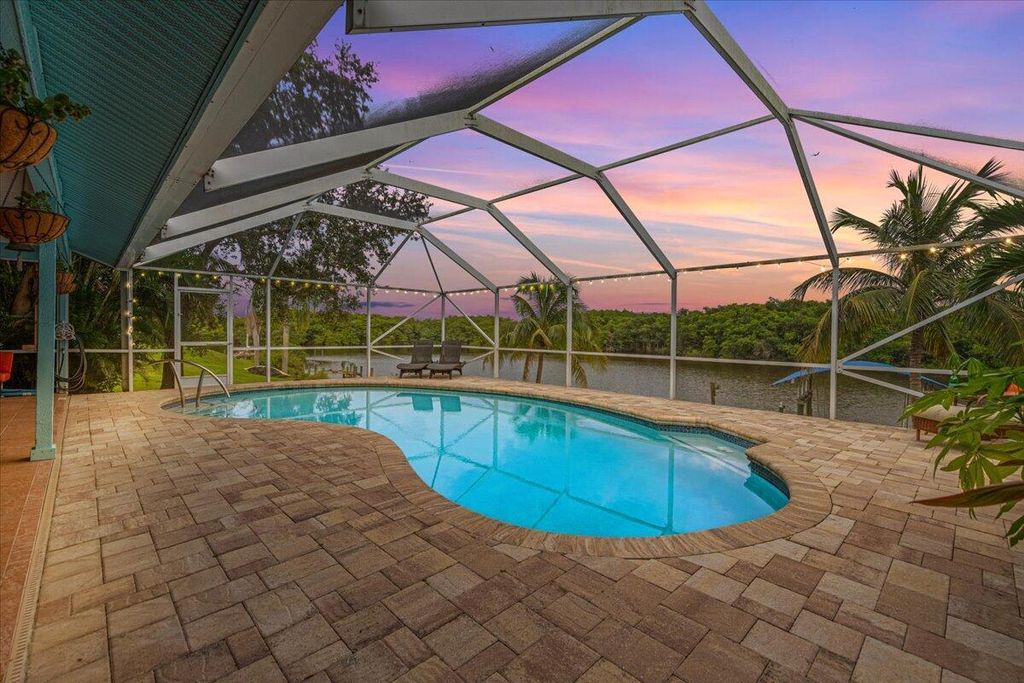 Photo of 1101 SE Coral Reef Street, Port Saint Lucie, FL 34983 (MLS # R11021260)