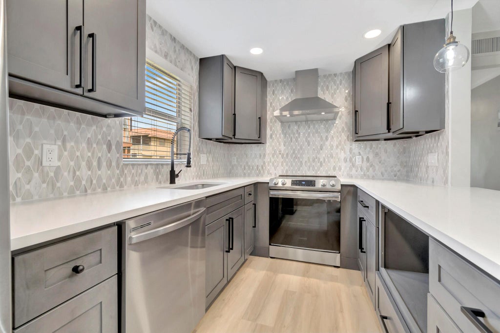 Photo of 484 Saxony Drive, Delray Beach, FL 33446 (MLS # R11004054)