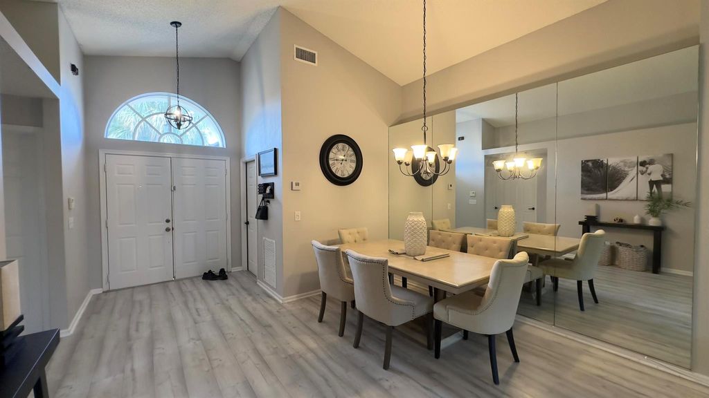 Photo of 320 Hammocks Trail, Greenacres, FL 33413 (MLS # R11118893)