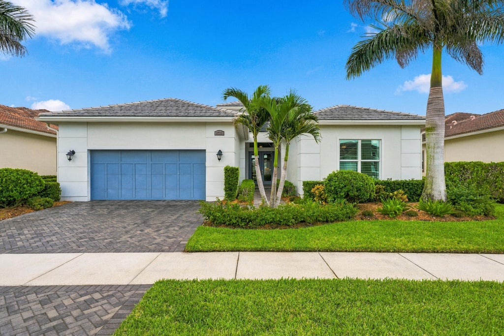 Photo of 8711 SW FLUTTO Way, Port Saint Lucie, FL 34987 (MLS # B26079694)