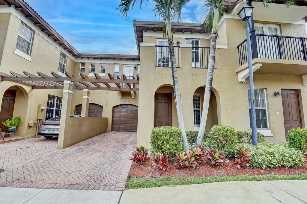 Photo of 6854 Julia Gardens Drive #6854, Coconut Creek, FL 33073 (MLS # R10868405)