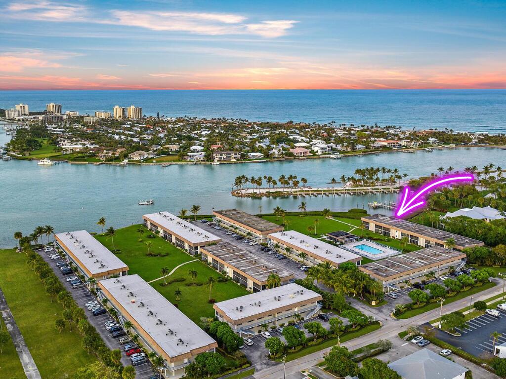Photo of 755 Saturn A104 Street #A104, Jupiter, FL 33477 (MLS # R11052878)