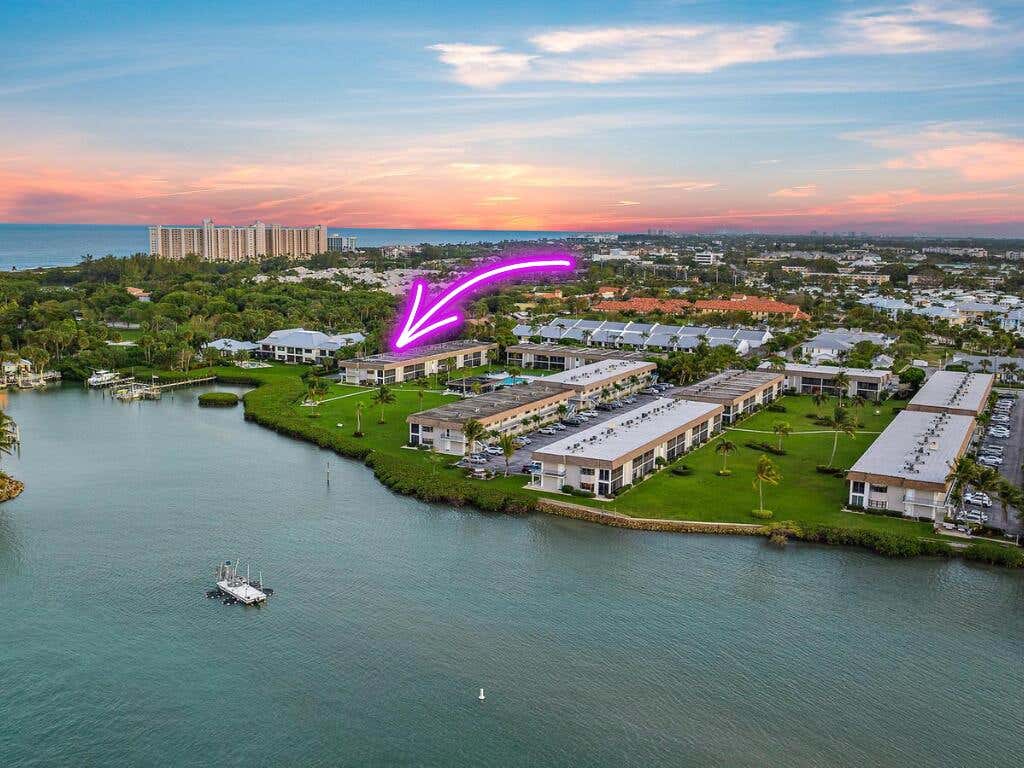 Photo of 755 Saturn A104 Street #A104, Jupiter, FL 33477 (MLS # R11052878)