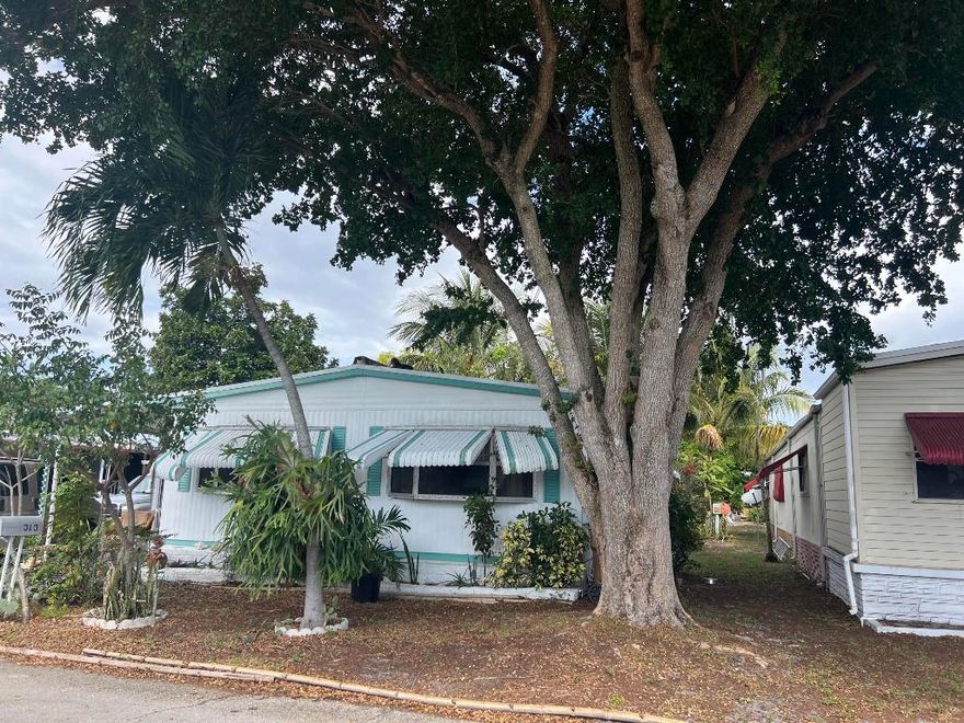 THIS IS A DOUBLE SIZE MOBILE HOME LOCATED IN A NON GATED COMMUNITY, THE LAND IS NOT INCLUDED AND  THE MONTHLY LOT RENTAL IS $1,234.00. THIS MOBILE HOME REQUIRES LOTS OF TLC, VERY LARGE SPACE, AND IN THE BACK OF THE HOUSE HAS A BEAUTIFUL ENCLOSED GARDEN AND FENCED. NEW A/C HAS BEEN INSTALLED AND THE ROOF IS COMPLETED UPDATED. THIS MOBILE HOME CAN BE YOURS AND YOU CAN THE REMODELING AS YOU DESIRE. THE LOCATION IS JUST FEW MINTES AWAY FROM THE BEACH. DO NOT MISS THIS OPPORTUNITY!