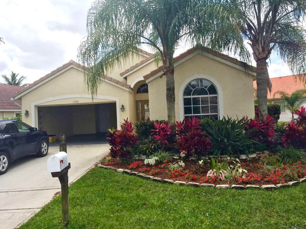 Photo of 1952 Carriage Brooke Drive, Wellington, FL 33414 (MLS # B26022230)