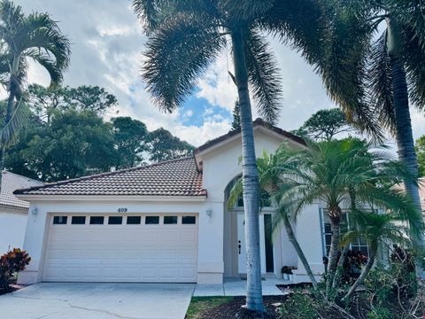 Photo of 409 Woodview Circle, Palm Beach Gardens, FL 33418 (MLS # R11164626)