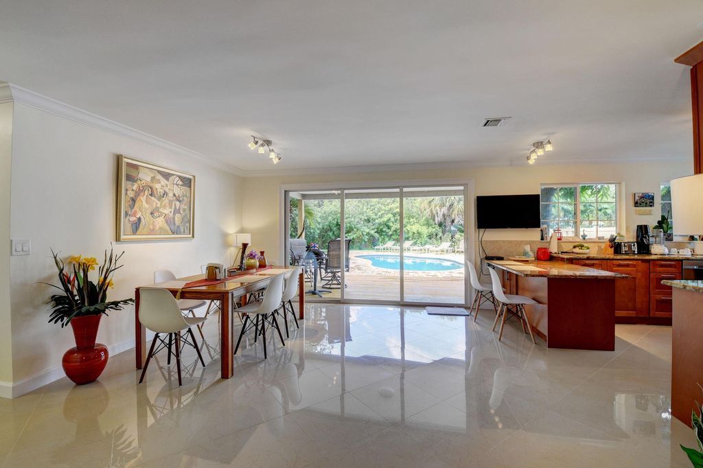 Photo of 1636 NE 3rd Avenue, Delray Beach, FL 33444 (MLS # R10938031)