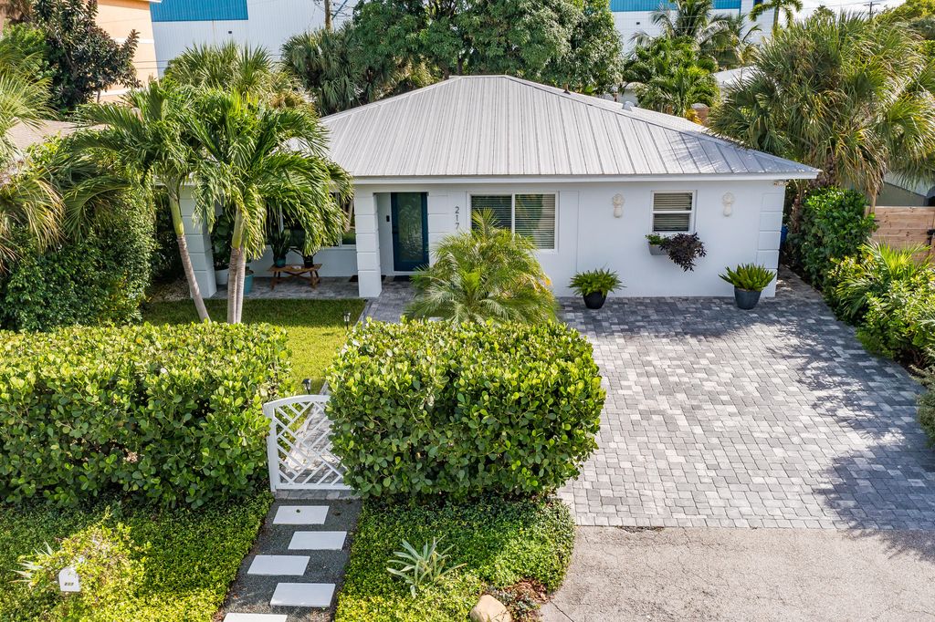 Photo of 217 E 23rd Street, Riviera Beach, FL 33404 (MLS # R11128869)