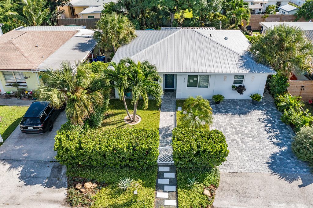 Photo of 217 E 23rd Street, Riviera Beach, FL 33404 (MLS # R11128869)