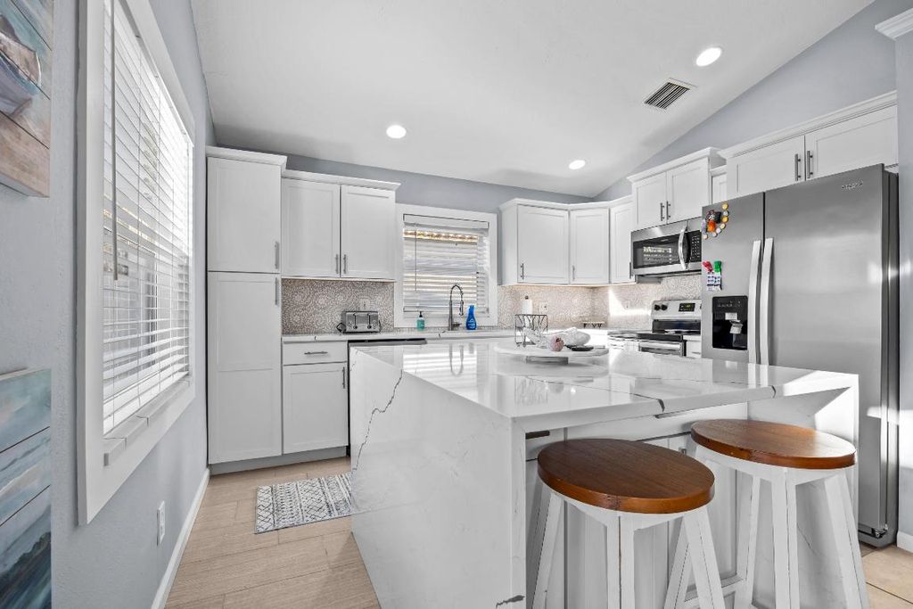 Photo of 1664 Carriage Brooke Drive, Wellington, FL 33414 (MLS # R11126121)