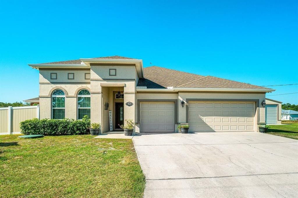 Photo of 1960 SW Aaron Lane, Port St Lucie, FL 34953 (MLS # R10873270)