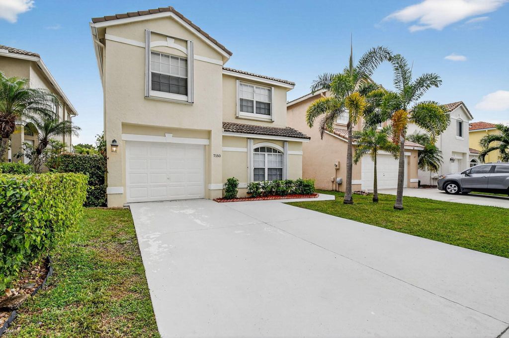 Photo of 7150 Craw Key Way, Lake Worth, FL 33467 (MLS # R11159507)