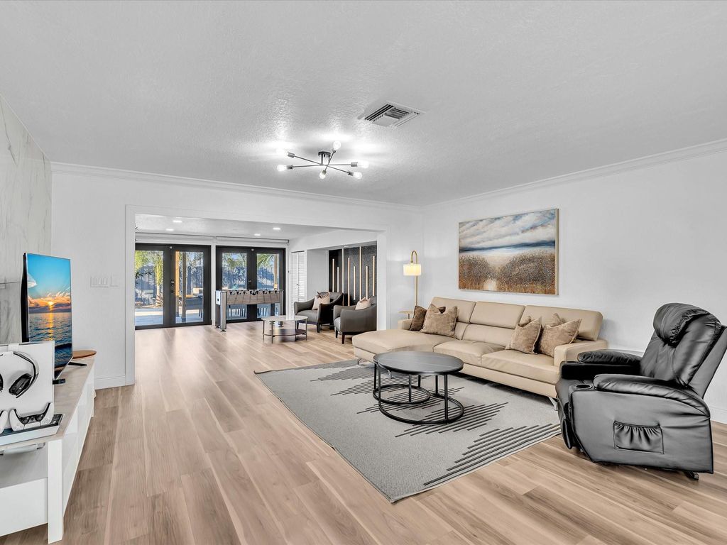 Photo of 2105 NE 62nd Street, Fort Lauderdale, FL 33308 (MLS # F10543964)