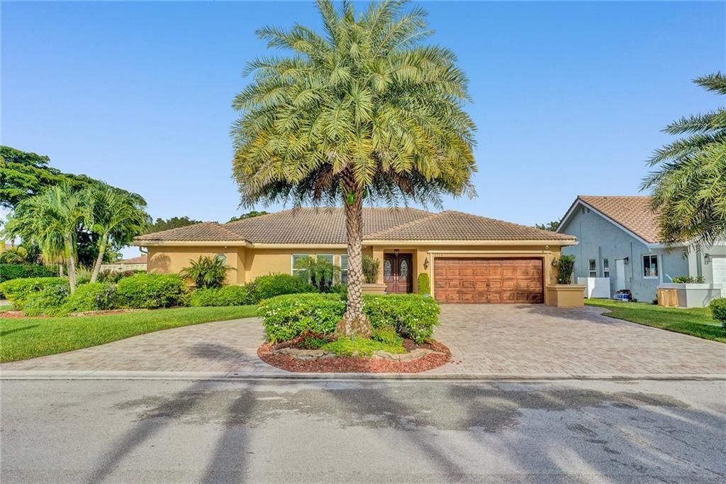 Photo of 5514 NW 58th Terrace, Coral Springs, FL 33067 (MLS # F10293881)