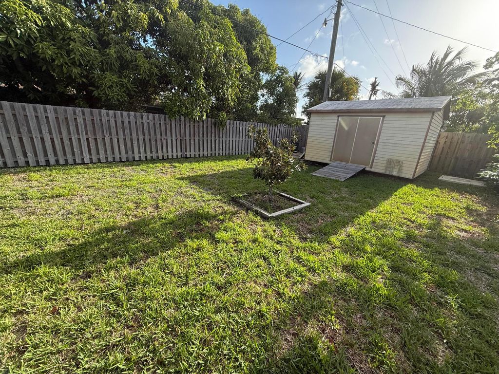Photo of 817 Elm Road, West Palm Beach, FL 33409 (MLS # B26032062)