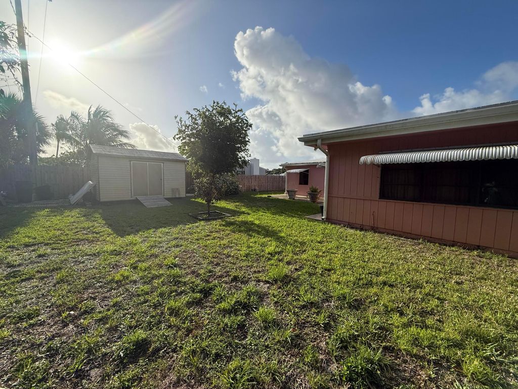 Photo of 817 Elm Road, West Palm Beach, FL 33409 (MLS # B26032062)