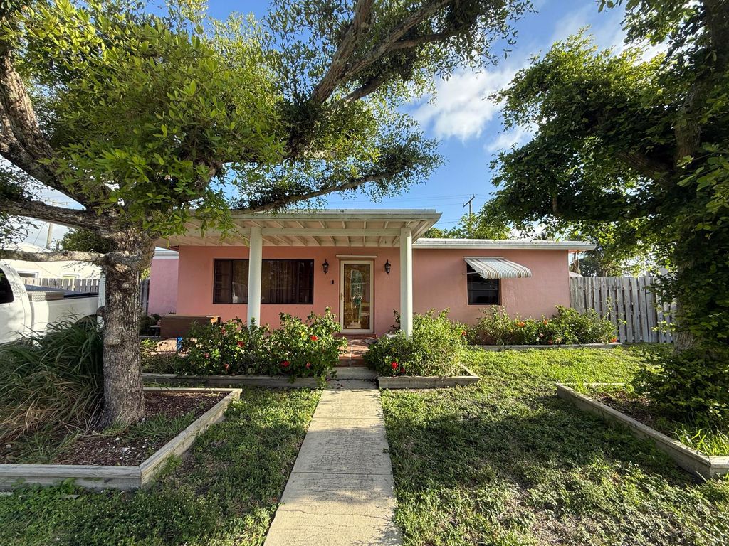Photo of 817 Elm Road, West Palm Beach, FL 33409 (MLS # B26032062)