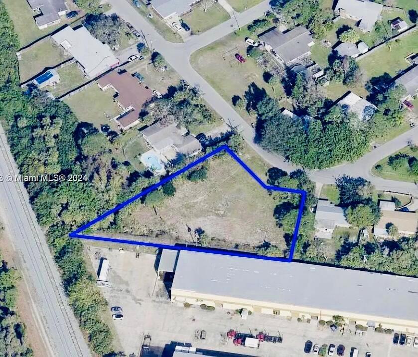 CLOSE TO 1 ACRE!. and CLEARED RECENTLY .78-acre property offers many opportunities for investors or for building. With access to both city water, city sewer, and a well,. Situated near US1 and the INTERCOASTAL This is brilliant for fishing and boating enthusiasts. The open and very wide lot is ideal for constructing a workshop or an oversized garage, perfect for storing boats, RVs, jet skis, or campers. Additionally, the newly approved Palm Bay zoning permits Accessory Dwelling Units (ADUs), opening doors for the construction of a separate, fully functional guest or in-law house. This presents exciting possibilities for short or long-term rental income.
