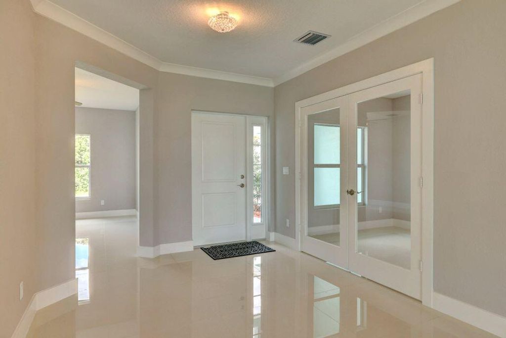 Photo of 1973 SW Golden Avenue, Port Saint Lucie, FL 34953 (MLS # R10968254)