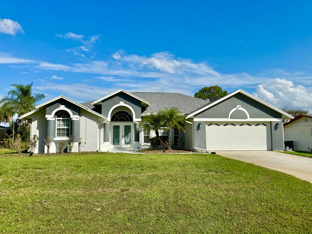 Photo of 1438 SE Griffin Terrace, Port Saint Lucie, FL 34952 (MLS # B26028638)