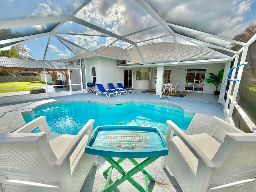 An exceptional rental opportunity in Port St. Lucie — arguably one of the finest homes available in the area. Thoughtfully and impeccably renovated throughout, this residence blends modern sophistication with effortless comfort, offering the ideal setting for both refined living and elegant entertaining. Spanning approximately 2,100 square feet, the home features an expansive open-concept layout with 3 spacious bedrooms and 2 beautifully appointed full baths. The outdoor living experience is equally impressive, highlighted by a screened and heated pool, covered lanai, and a newly constructed pergola complete with a gas fire pit and dedicated gas line for grilling. A two-car garage and propane gas cooktop and pool heater further enhance the home's upscale amenities.  The property may be offered partially furnished, if desired. Enjoy the freedom of no HOA restrictions.  Applicants are subject to credit and background screening, along with verification of income. Pets may be considered on a case-by-case basis at the sole discretion of the landlord and may require an additional fee. First month's rent, last month's rent, and security deposit are required. Tenant is responsible for electric, water, gas, pool service, and lawn maintenance.