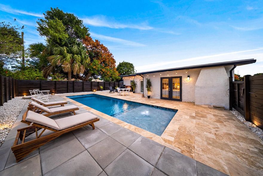 Totally renovated 4 bed 3 bath home in the heart of Stuart! Offering modern finishes and a brand new pool, this move-in-ready residence has a fully enclosed wrap around yard. Inside, you'll find a thoughtfully updated interior and a functional layout.  The open-concept kitchen and living area benefit from the vaulted ceiling, giving the space a bright, airy feel.  Split & generously sized en-suite bedrooms, make this an ideal house for entertaining, or hosting guests.  Located just minutes from vibrant downtown Stuart, and just a short drive to the beach, this home offers the perfect blend of style, comfort, and convenience in a highly desirable area.