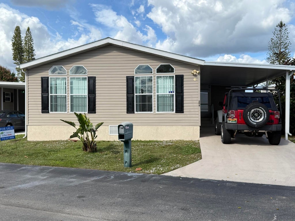 Photo of 294 Kingfisher Avenue, Fort Pierce, FL 34982 (MLS # B26056899)