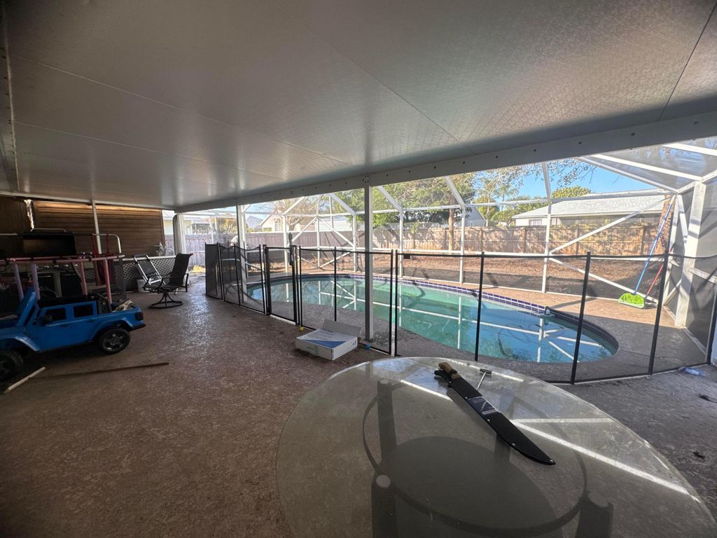 Photo of 607 SE Dean Terrace, Port Saint Lucie, FL 34984 (MLS # R11159406)