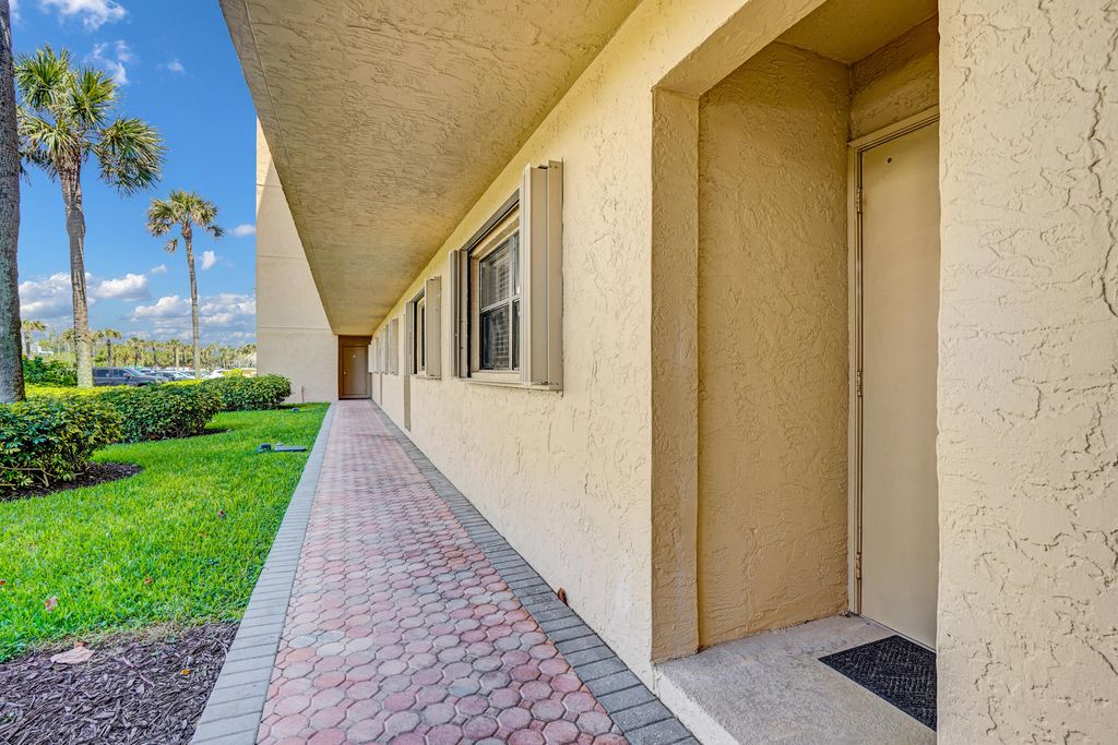 Photo of 10200 S Ocean Drive #104, Jensen Beach, FL 34957 (MLS # B26020849)