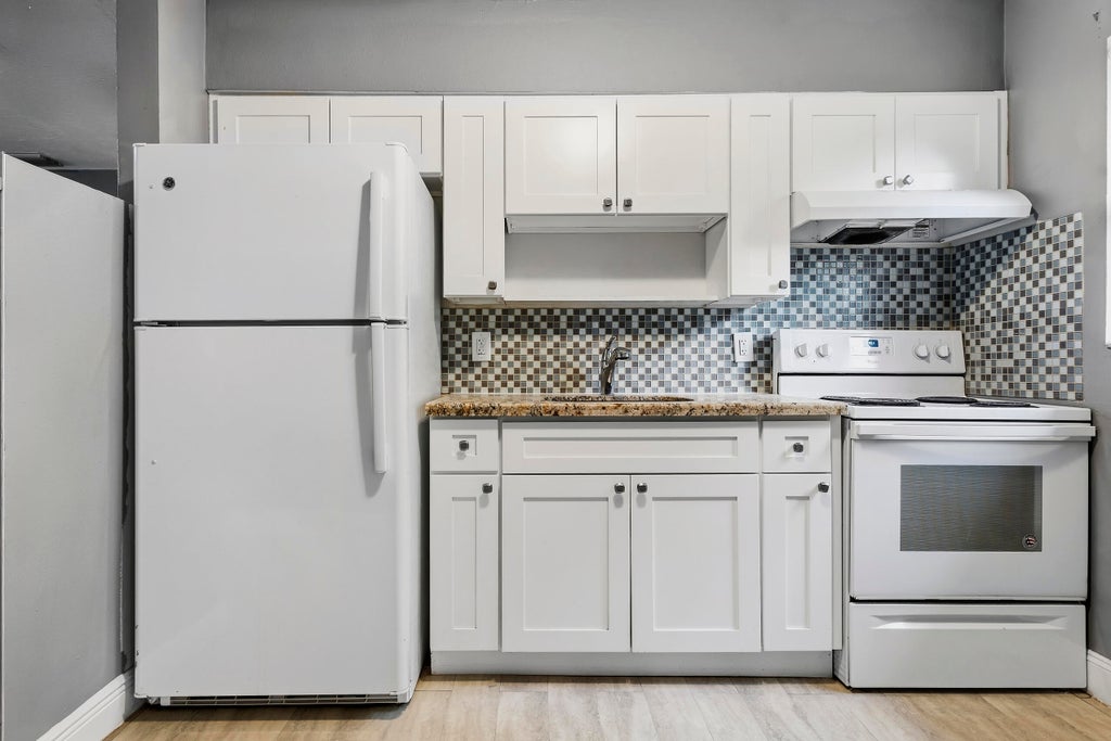 Photo of 741 NW 4TH Avenue, Fort Lauderdale, FL 33311 (MLS # B26081831)