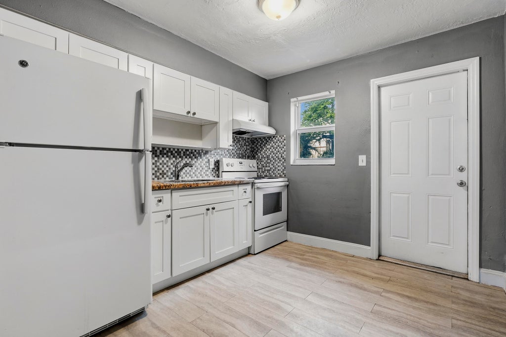 Photo of 741 NW 4TH Avenue, Fort Lauderdale, FL 33311 (MLS # B26081831)