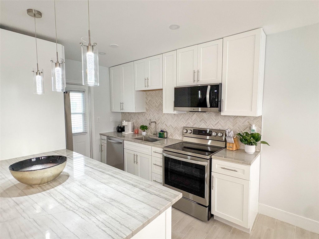 Photo of 4541 N Ocean Drive #8, Lauderdale By The Sea, FL 33308 (MLS # F10527981)