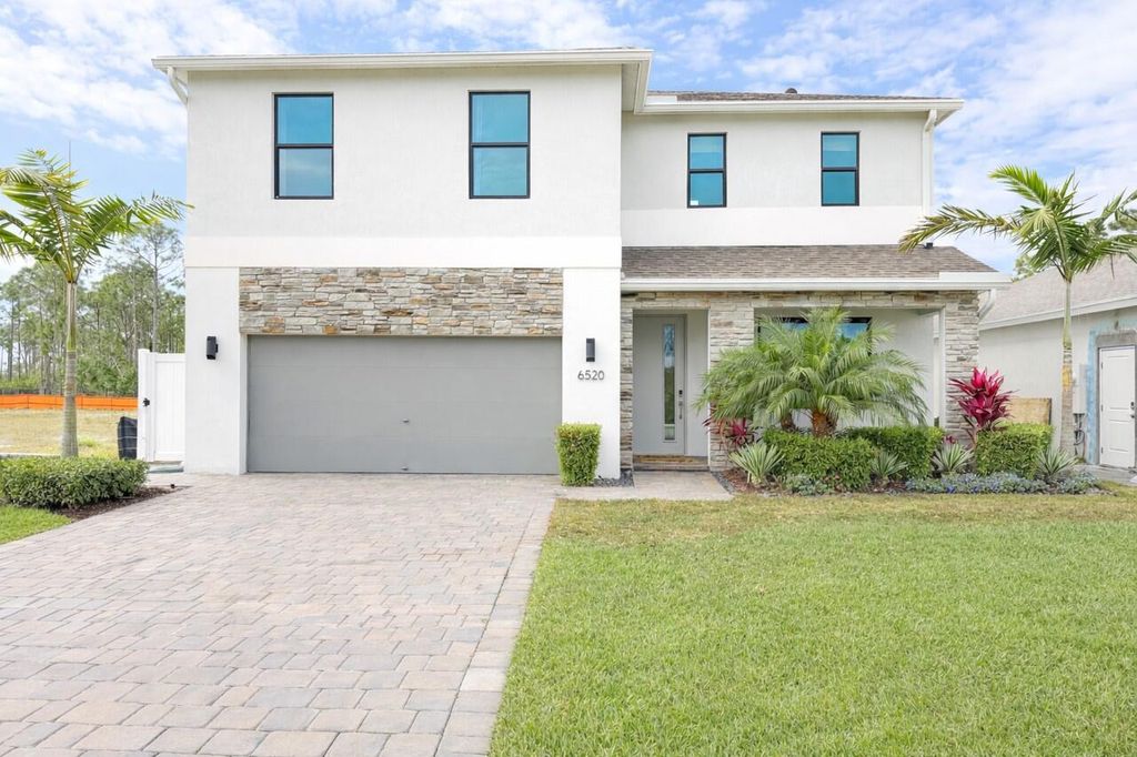Photo of 6520 SE Park Trace Drive, Stuart, FL 34997 (MLS # R11159389)