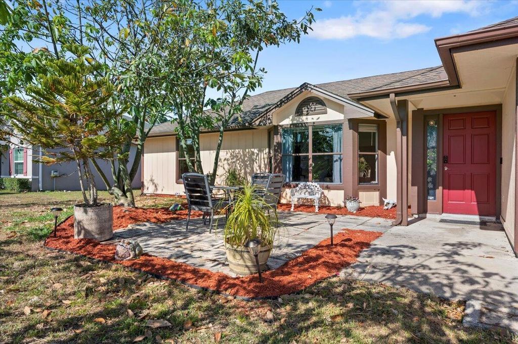 Photo of 3818 SW Alice Street, Port Saint Lucie, FL 34953 (MLS # R10979368)