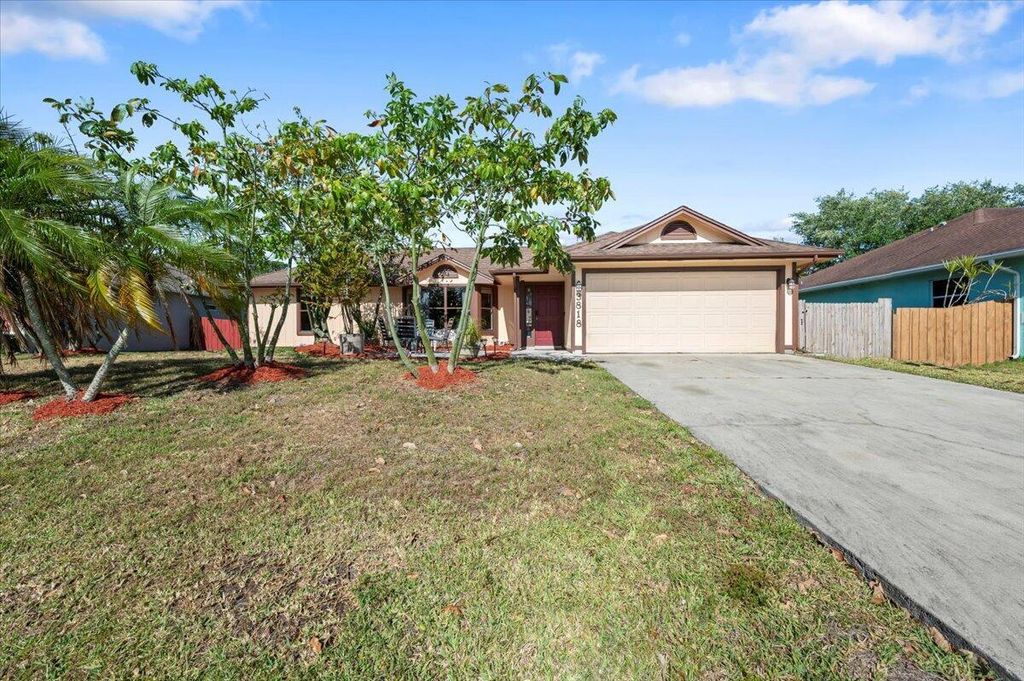 Photo of 3818 SW Alice Street, Port Saint Lucie, FL 34953 (MLS # R10979368)