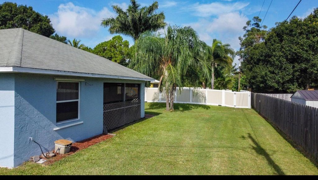 Photo of 359 SW Duxbury Avenue, Port Saint Lucie, FL 34983 (MLS # B26001529)