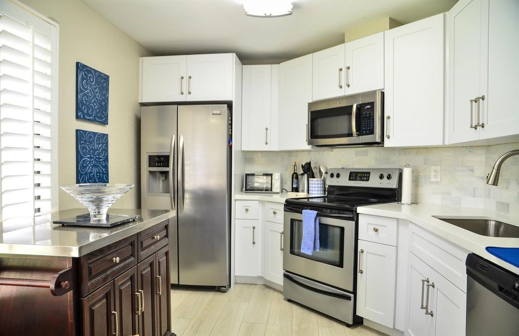 Photo of 406 Harbour Pointe Way, Greenacres, FL 33413 (MLS # R10906310)