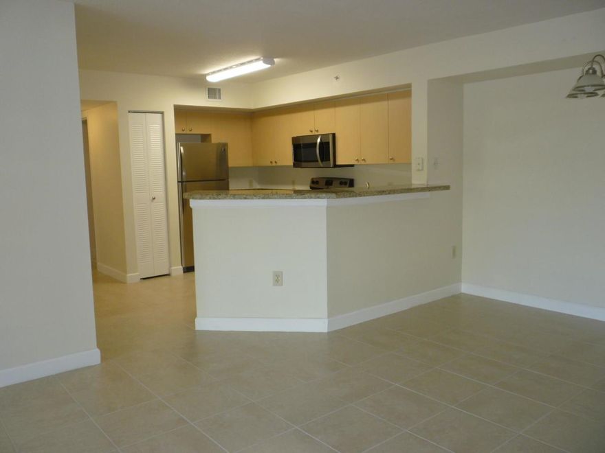 This beautiful and spacious second-floor condo is located in a secure gated community near downtown West Palm Beach. The unit features new laminate flooring in the bedrooms, modern stainless steel appliances, and a convenient in-unit washer and dryer. Enjoy easy access to CityPlace, Palm Beach beaches, and the West Palm Beach airport, all just minutes away.The condo will be available for move-in on January 1, 2026. First month's rent, last month's rent, and a security deposit are required prior to move-in. Up to two pets are welcome with a pet deposit. This is the perfect place to enjoy comfortable living in a great location close to everything West Palm Beach has to offer.