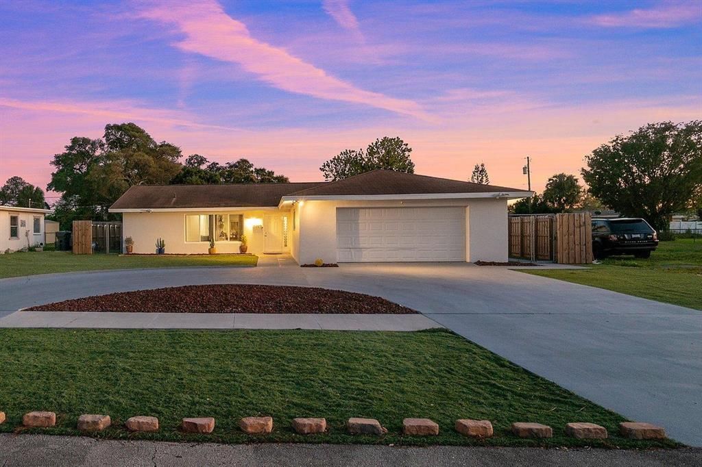 Photo of 528 Date Palm Drive, Lake Park, FL 33403 (MLS # R10694932)