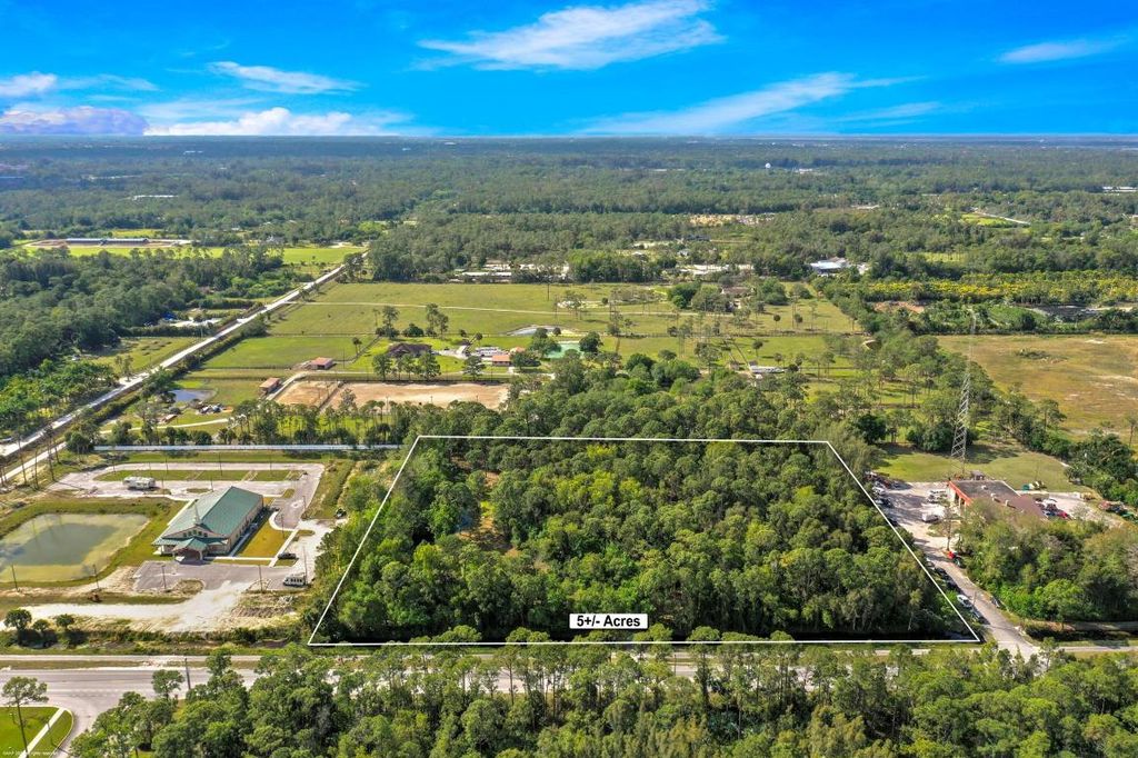 Photo of 14148 Okeechobee Boulevard, Loxahatchee Groves, FL 33470 (MLS # R11141707)