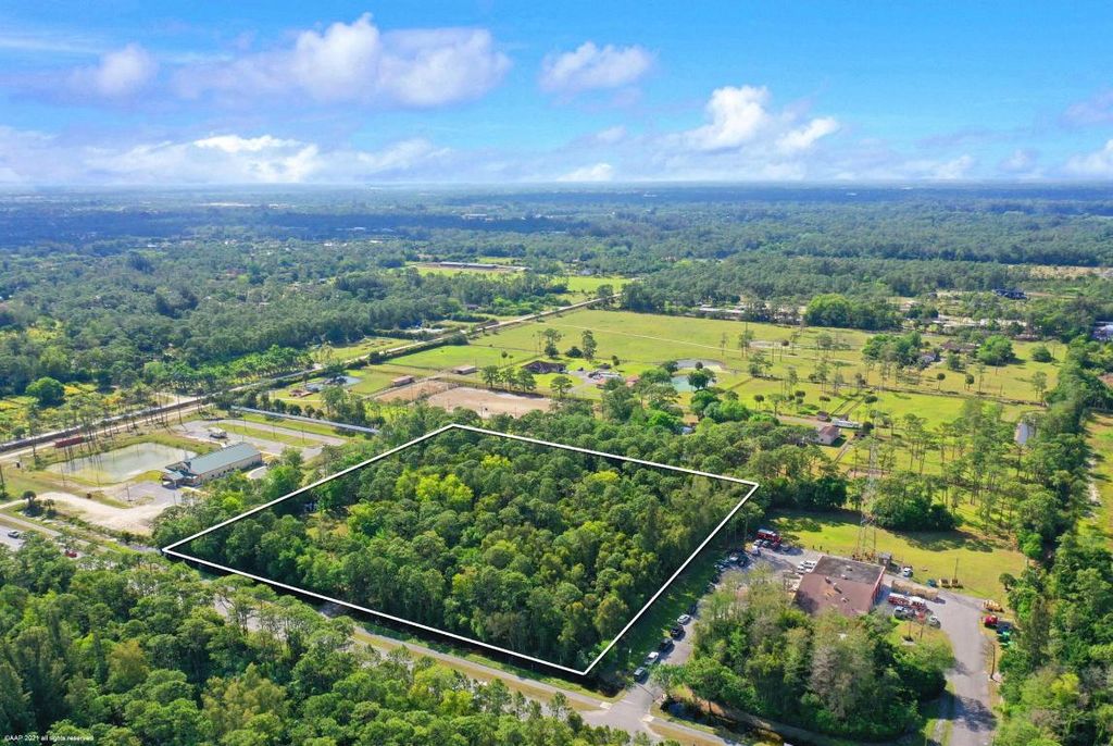 Photo of 14148 Okeechobee Boulevard, Loxahatchee Groves, FL 33470 (MLS # R11141707)