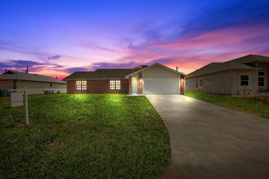 Photo of 4209 SW Tuscol Street, Port Saint Lucie, FL 34953 (MLS # B26007498)