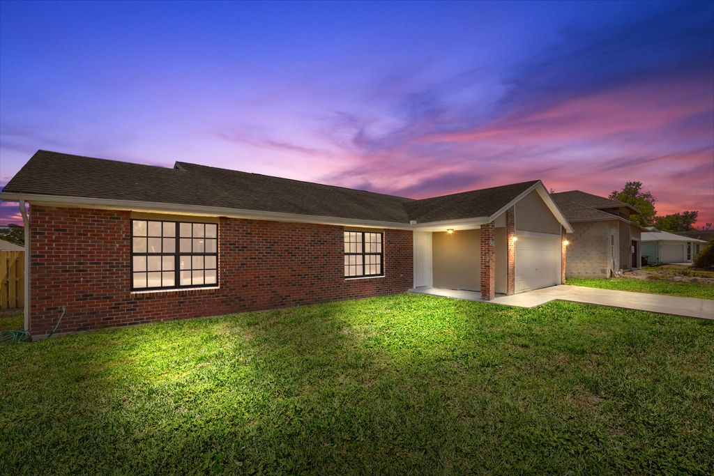 Photo of 4209 SW Tuscol Street, Port Saint Lucie, FL 34953 (MLS # B26007498)