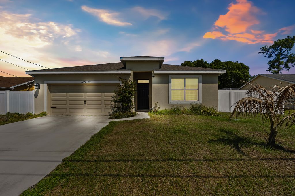 Photo of 1277 SW Marmore Avenue, Port Saint Lucie, FL 34953 (MLS # F10551108)