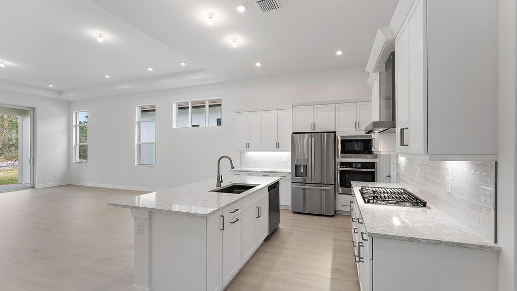 Photo of 2857 SE Ashfield Drive, Port Saint Lucie, FL 34984 (MLS # R11045906)