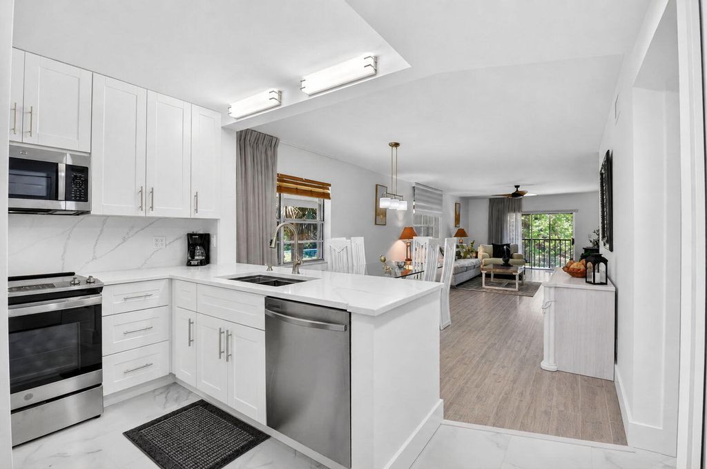 Photo of 2975 SW 22nd Avenue #2010, Delray Beach, FL 33445 (MLS # B26029259)