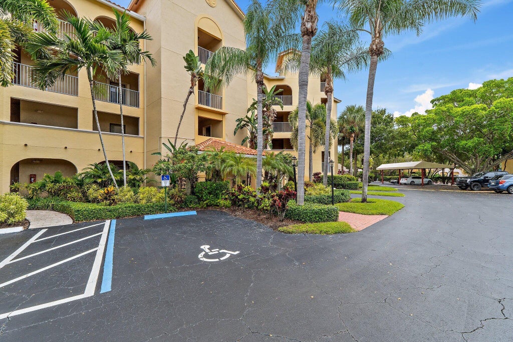Photo of 300 Uno Lago Drive #204, Juno Beach, FL 33408 (MLS # B26081974)