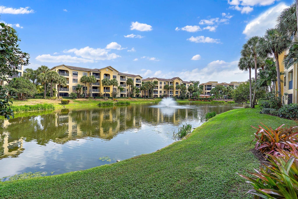 Photo of 300 Uno Lago Drive #204, Juno Beach, FL 33408 (MLS # B26081974)